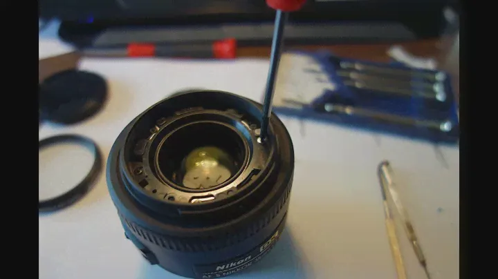 Nikon 35mm f/1.8 DX Lens Front Element Removal and Dust Cleaning