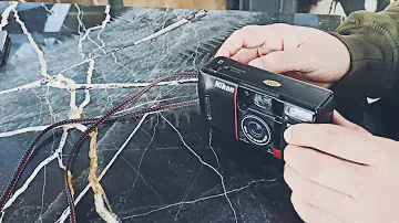 LOADING THE NIKON TW20 WITH A ROLL OF KODAK GOLD 200